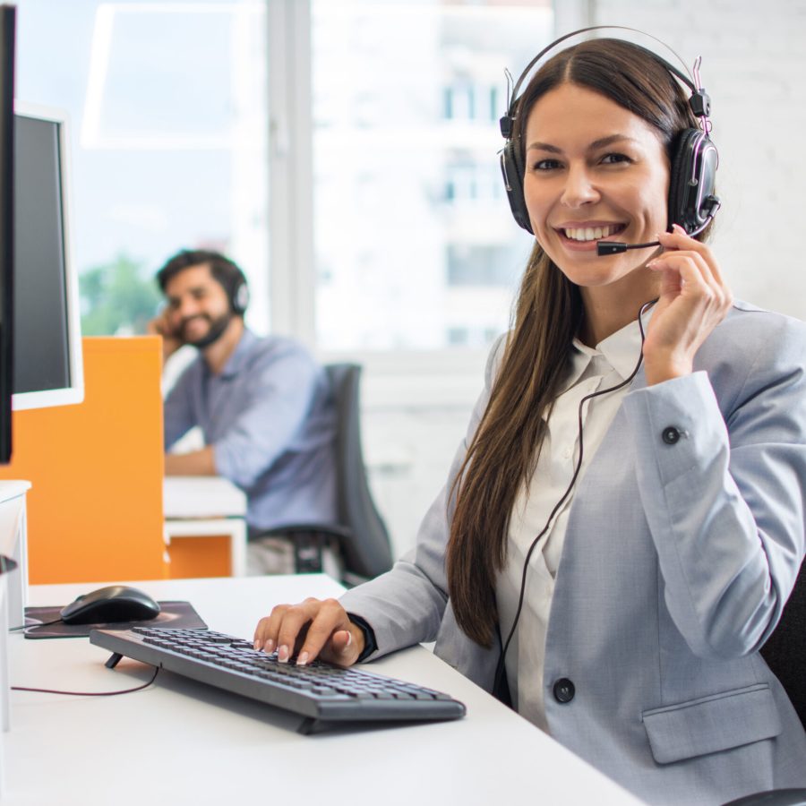 Female customer support operator working in call center. Help and technical support concept.