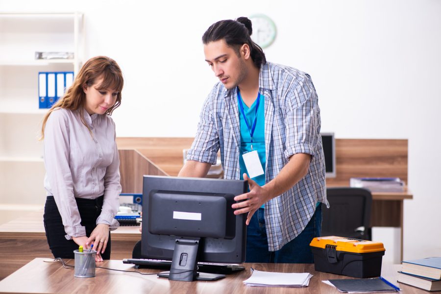 Young male it specialist in the office The young male it specialist in the office