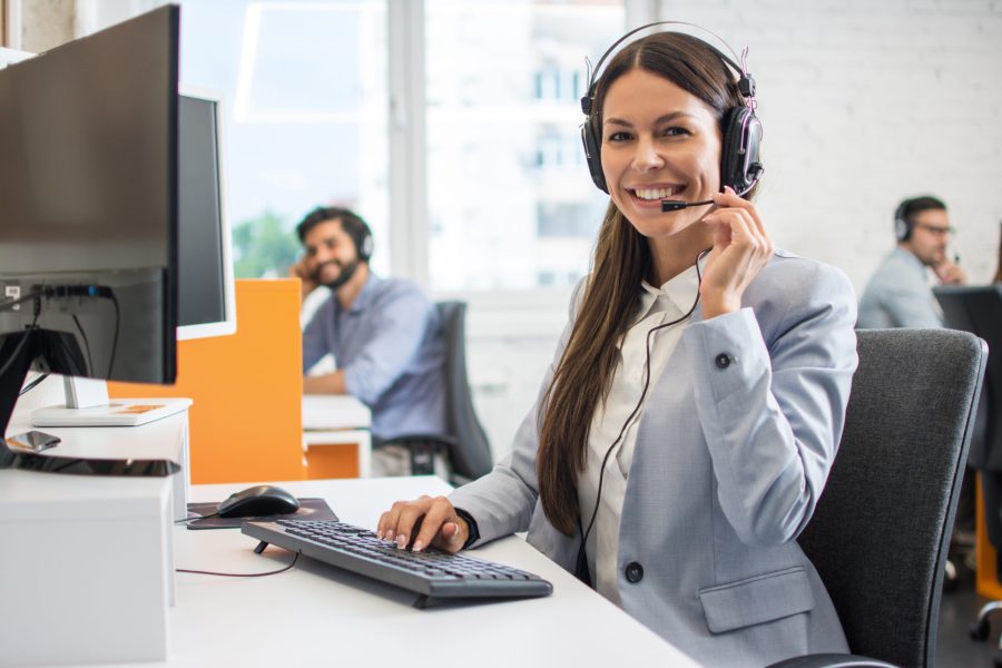 Female customer support operator working in call center. Help and technical support concept.